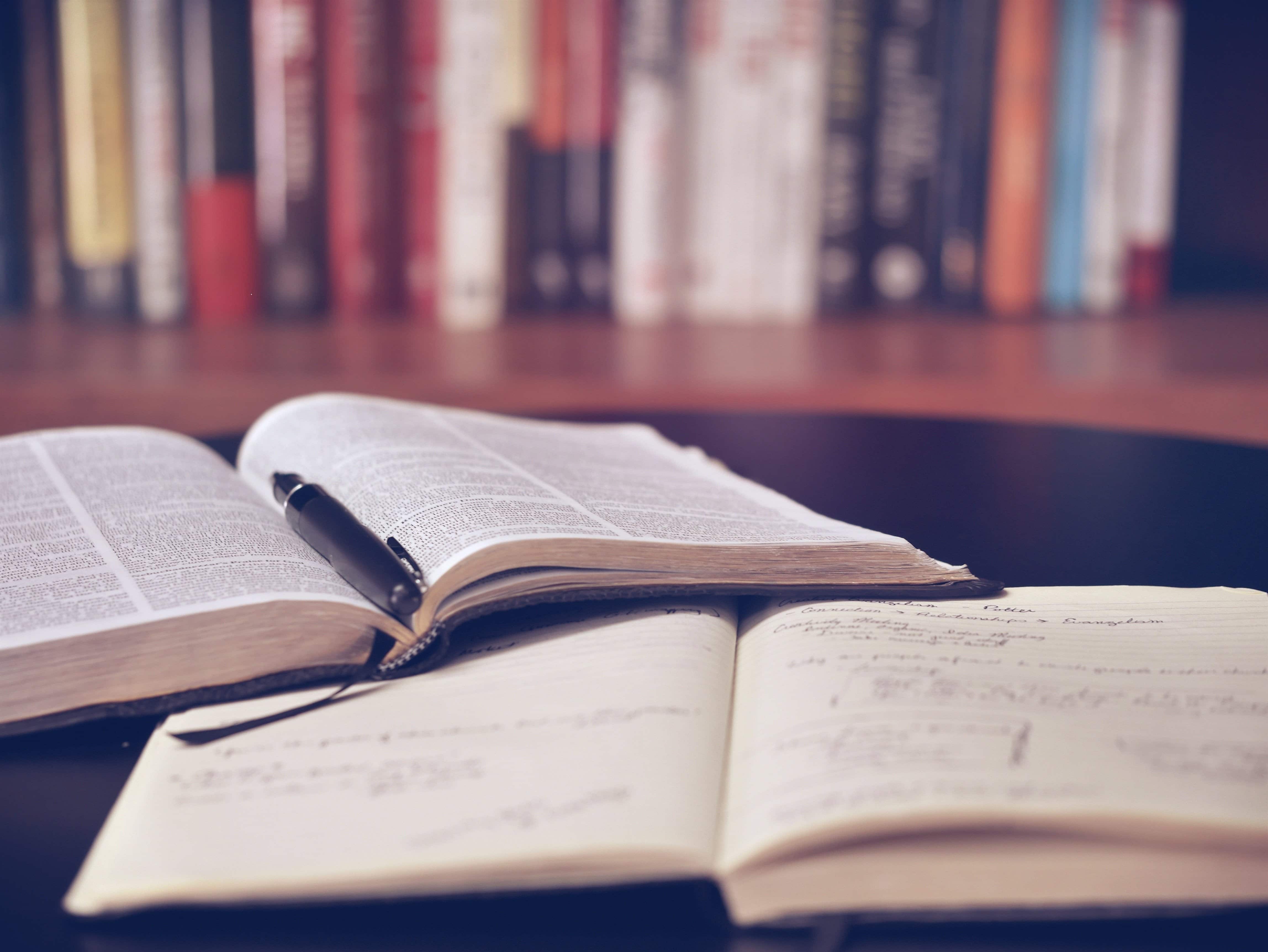 A stack of old books, the kind a family life story becomes